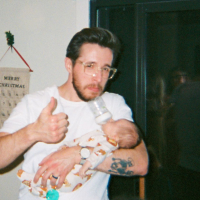 harvey holding a baby